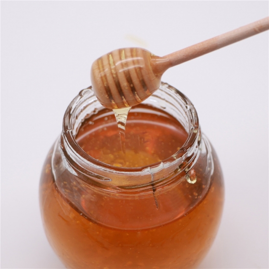 العسل الطبيعي الأصلي النقي العنبر النقي في زجاجة 
